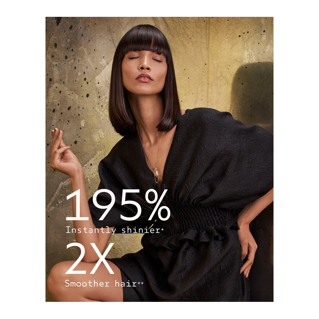 Woman with styled hair against a textured wall background with text about hair product benefits.